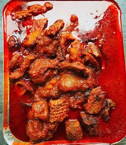Rice and beans with fish stew and plantain